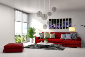 Salón con sofá mesa alfombre y lámparas colgantes de bolas reformas integrales de Barcino Construcciones